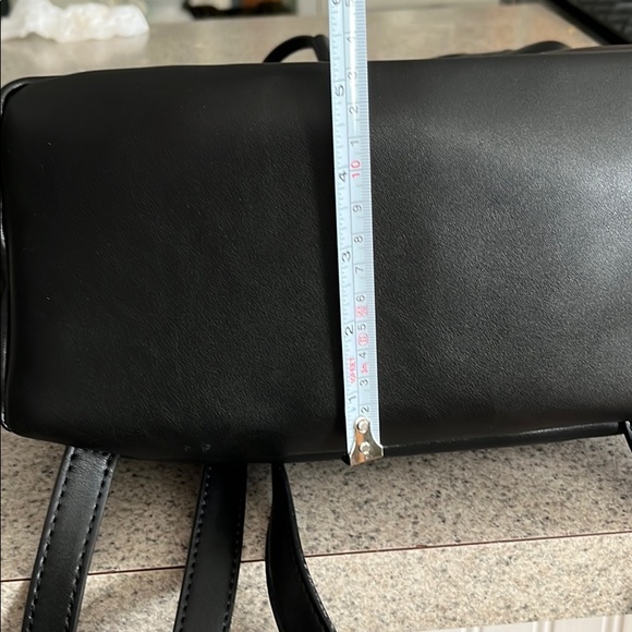 ASOS DESIGN slouchy backpack with oversized pocket - Picture 8 of 8